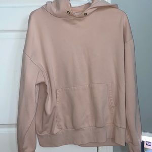 Light pink women’s hoodie used with hood and no strings